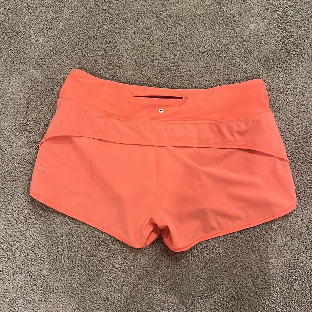 Lululemon 4” speed-up neon pink-orange shorts